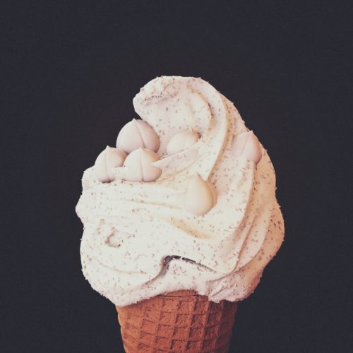 Photorealistic 3d illustration of hazelnut flavored ice cream cone. food design and food digital still life